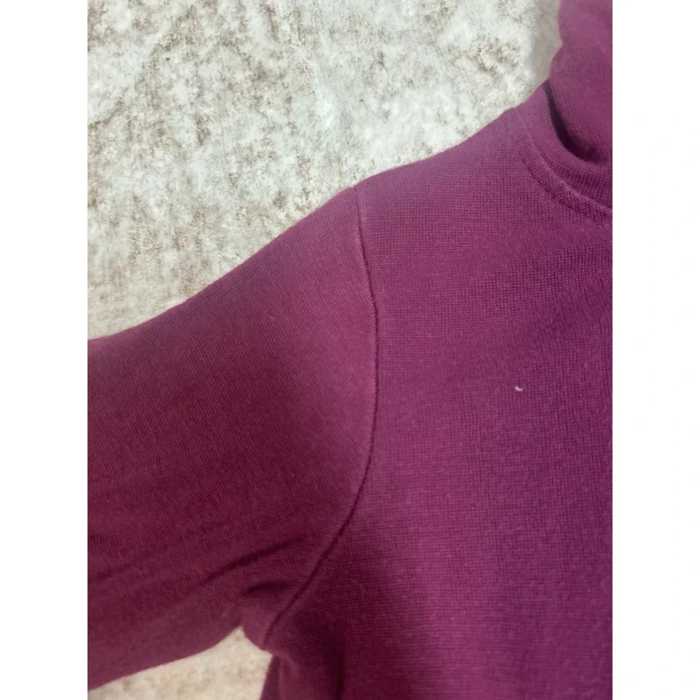 Kyte Baby Bamboo Jersey Hooded Zippered Romper in the color Dahlia